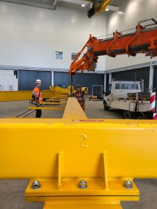 Attaching gantry crane to runner